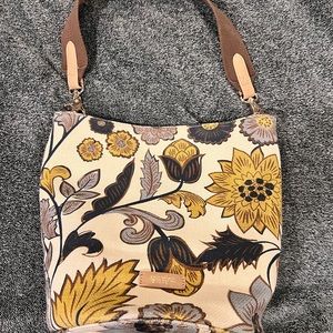 Spartina Bucket Bag with matching wallet.